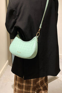 Schwarze Croc Mini Hobo Tasche im modernen Stil