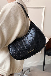 Schwarze Croc Mini Hobo Tasche im modernen Stil