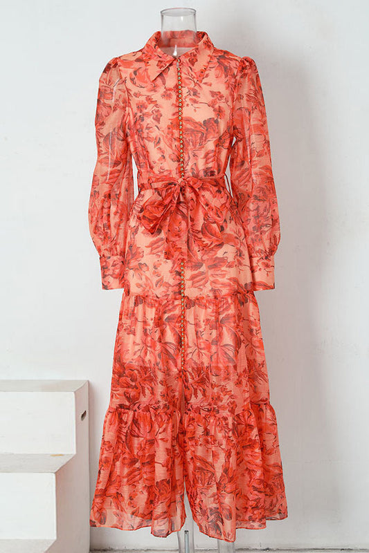 Queena Langes Kleid mit Ballonärmeln und Aufdruck