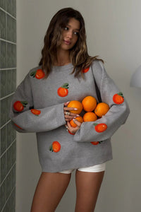 Mädchen Pullover aus orangefarbenem, floriertem Strick im modernen Stil