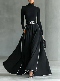 Maxikleid mit hohem Kragen, langen Ärmeln, schwarzer Naht, weißem Besatz und engem Gürtel