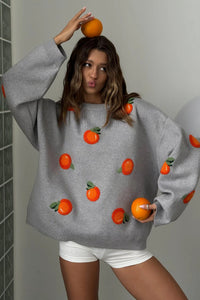 Mädchen Pullover aus orangefarbenem, floriertem Strick im modernen Stil