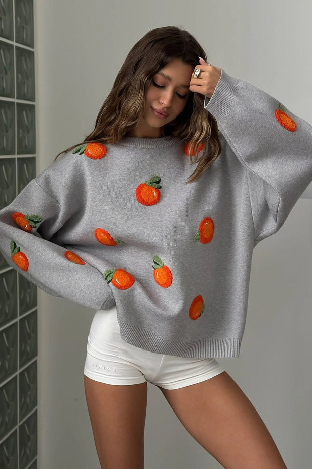 Mädchen Pullover aus orangefarbenem, floriertem Strick im modernen Stil