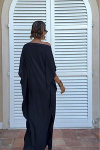 Fließender asymmetrischer Kaftan mit Gürtel im modernen Stil
