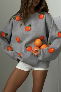 Mädchen Pullover aus orangefarbenem, floriertem Strick im modernen Stil