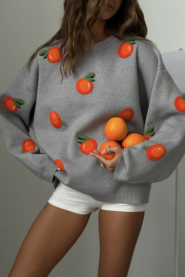 Mädchen Pullover aus orangefarbenem, floriertem Strick im modernen Stil