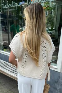 Gestrickter, hohler Damenpullover mit Schnürung im modernen Stil