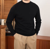 Pullover aus Wollmischung mit Stehkragen und schmalem Schnitt