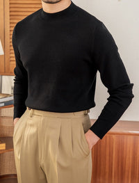 Pullover aus Wollmischung mit Stehkragen und schmalem Schnitt