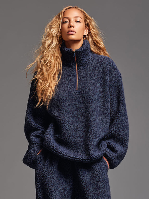Lässiges Sportset aus marineblauem Polar-Fleece mit halbem Reißverschluss und Sweatshirt-Hose im modernen Stil