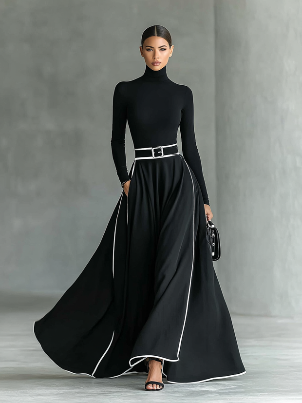 Maxikleid mit hohem Kragen, langen Ärmeln, schwarzer Naht, weißem Besatz und engem Gürtel