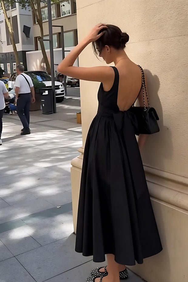 Modisches rückenfreies Kleid mit Schleife und Temperament im modernen Stil