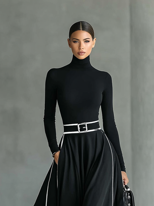 Maxikleid mit hohem Kragen, langen Ärmeln, schwarzer Naht, weißem Besatz und engem Gürtel