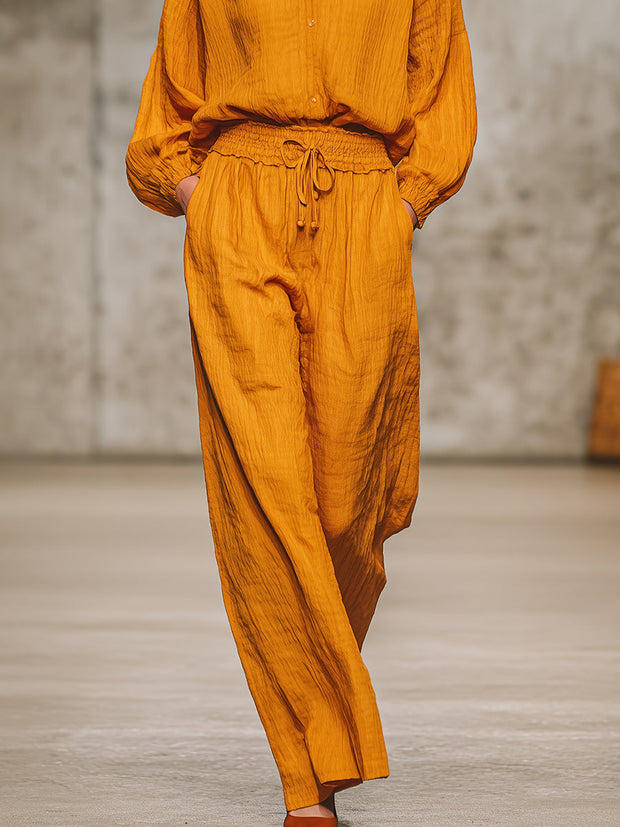 Lässiges Retro-Set aus orangefarbenem Hemd und Hose im modernen Stil
