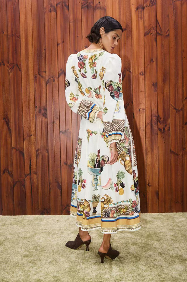 Marcella – Langes Kleid mit Ballonärmeln und Animalprint