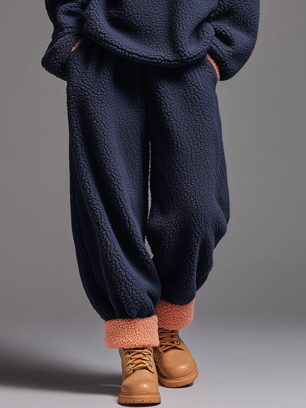 Lässiges Sportset aus marineblauem Polar-Fleece mit halbem Reißverschluss und Sweatshirt-Hose im modernen Stil