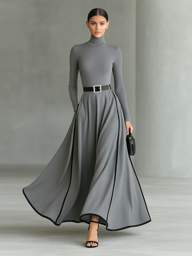 Maxikleid mit hohem Kragen, langen Ärmeln, schwarzer Naht, weißem Besatz und engem Gürtel