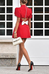 Modisches rückenfreies Kleid mit Schleife und Temperament im modernen Stil