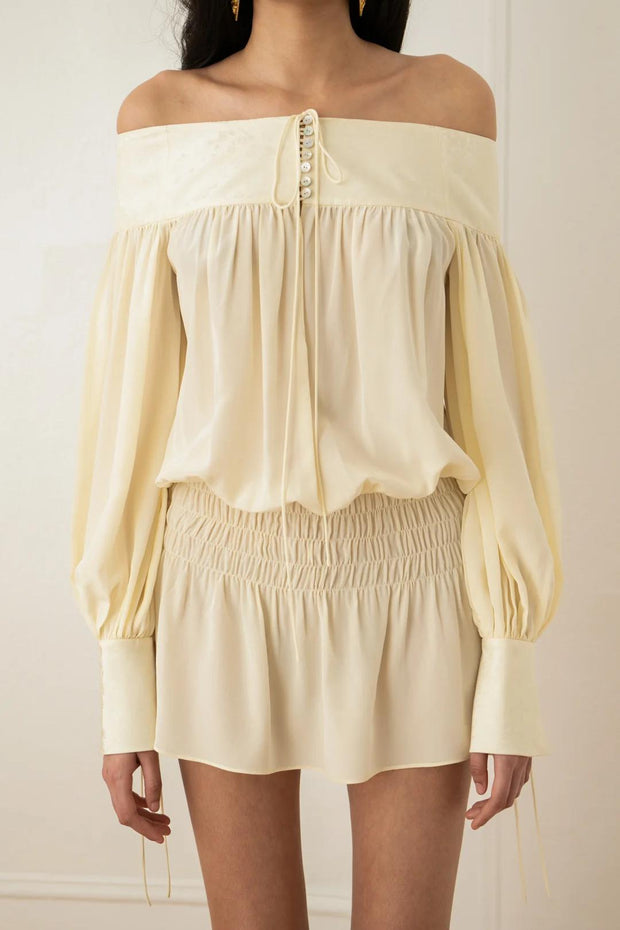Cremiges Schulterfrei-Kleid