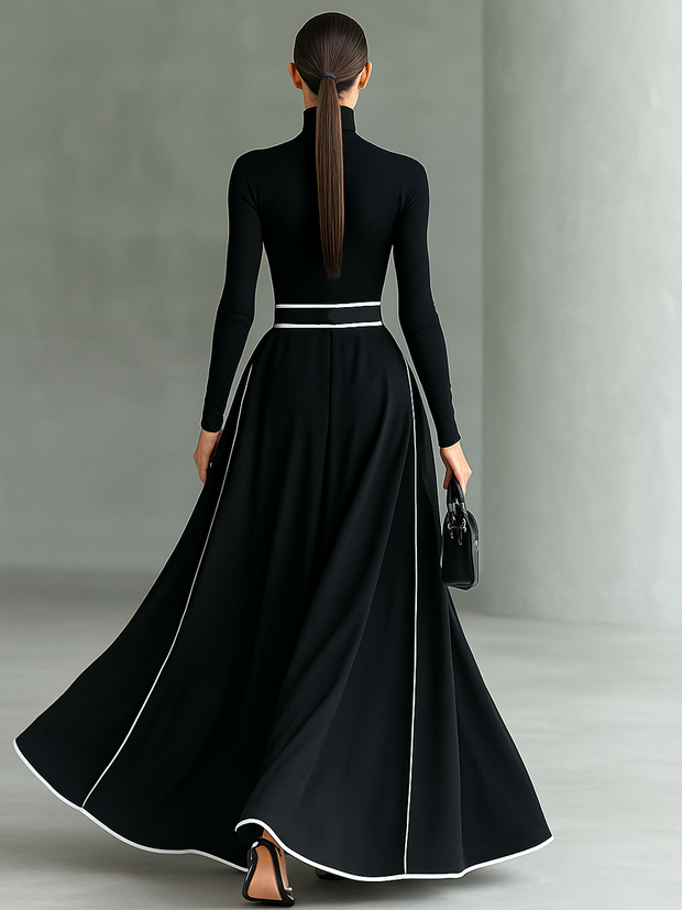 Maxikleid mit hohem Kragen, langen Ärmeln, schwarzer Naht, weißem Besatz und engem Gürtel
