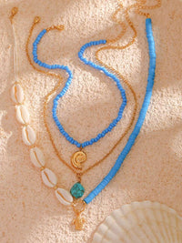 Bora Bora Muschelperlen Mehrlagige Halskette Gold im modernen Stil