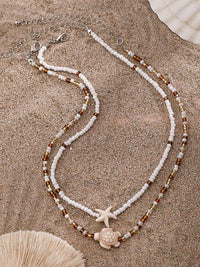 Strand-Seestern-Muschel-Halskette im modernen Stil