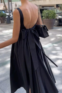 Modisches rückenfreies Kleid mit Schleife und Temperament im modernen Stil