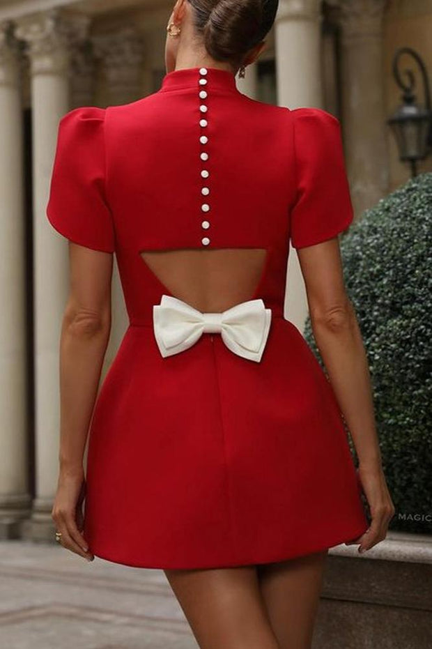 Modisches rückenfreies Kleid mit Schleife und Temperament im modernen Stil
