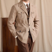 Jacke aus Wollmischung mit Fischgrätmuster und sportiver Optik
