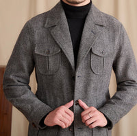 Jacke aus Wolle mit Fischgrätmuster und sportiver Optik