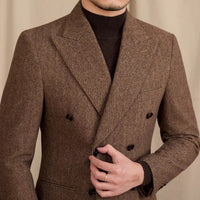Jacke aus Wollmischung mit Fischgrätmuster, doppelreihigem Schnitt und Spitzrevers