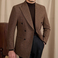 Jacke aus Wollmischung mit Fischgrätmuster, doppelreihigem Schnitt und Spitzrevers