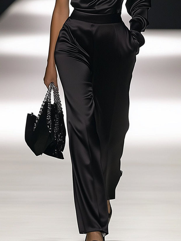 Eleganter Satin-Overall mit langen Ärmeln und schulterfreiem Schnitt