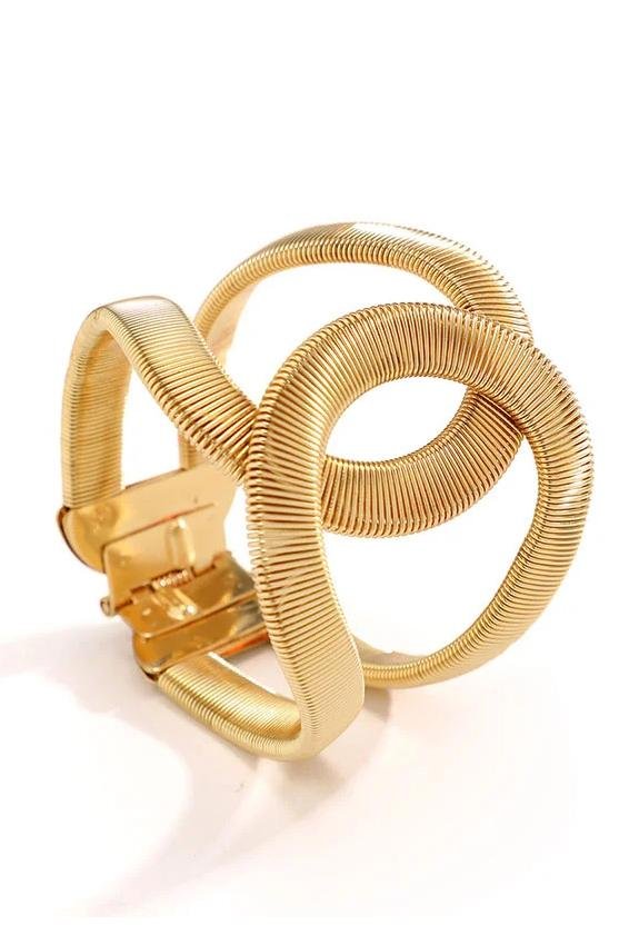 Armband mit geometrischem Muster und metallischer Struktur im modernen Stil