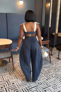 Schickes Retro-Set mit gestreiften Hosen mit weitem Bein im modernen Stil